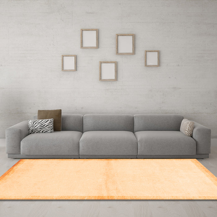 Machine Washable Solid Orange Modern Area Rugs in a Living Room, wshabs1910org