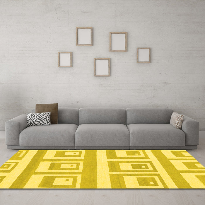 Machine Washable Solid Yellow Modern Rug in a Living Room, wshabs1922yw