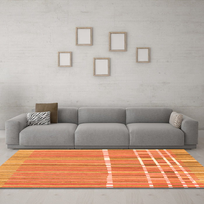 Machine Washable Abstract Orange Modern Area Rugs in a Living Room, wshabs1927org