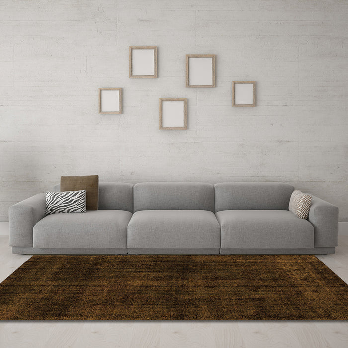 Machine Washable Abstract Orange Modern Area Rugs in a Living Room, wshabs1950org