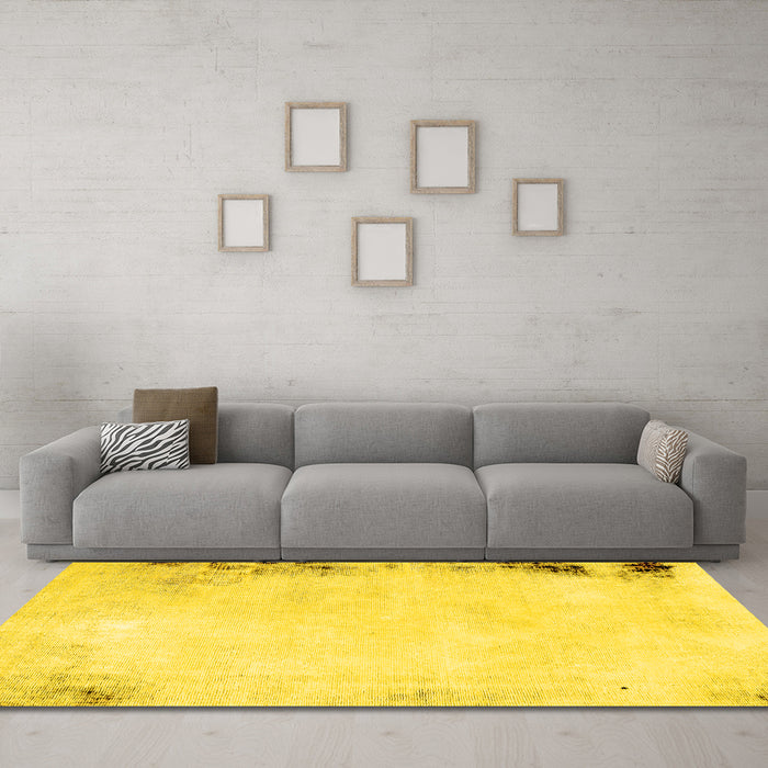 Machine Washable Solid Yellow Modern Rug in a Living Room, wshabs1975yw