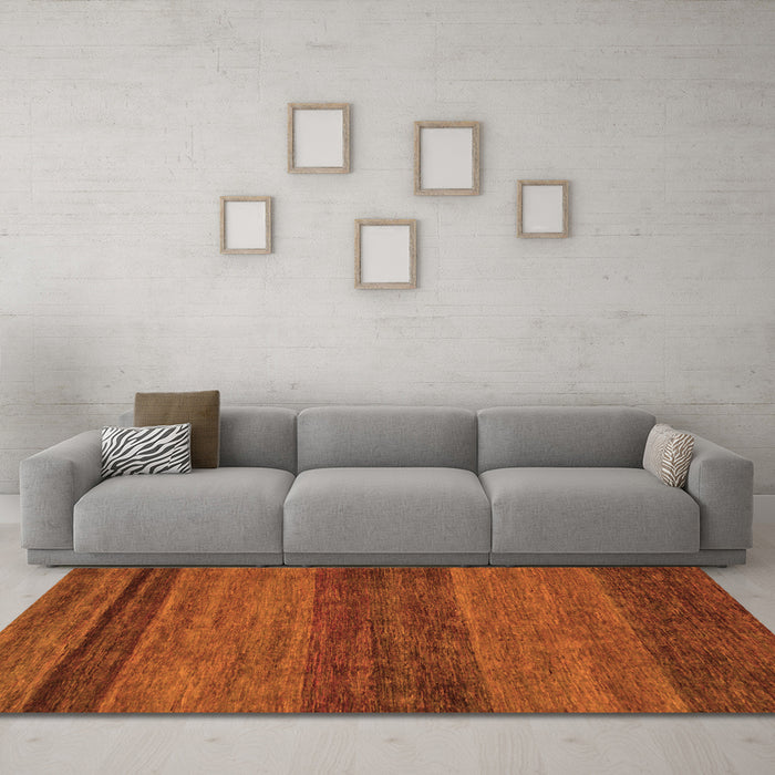 Machine Washable Abstract Orange Modern Area Rugs in a Living Room, wshabs19org