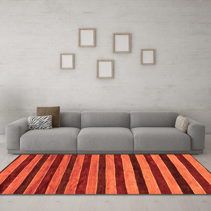 Machine Washable Abstract Orange Modern Area Rugs in a Living Room, wshabs20org