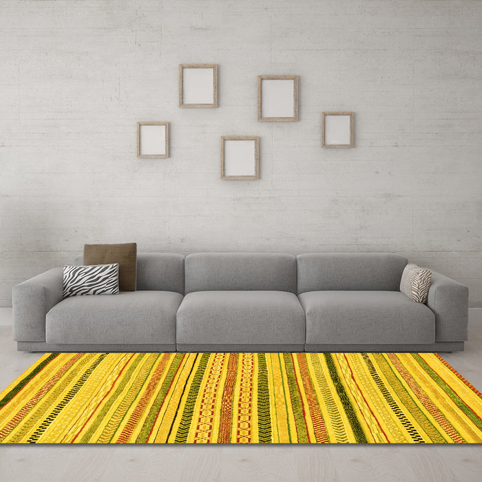 Machine Washable Solid Yellow Modern Rug in a Living Room, wshabs2202yw