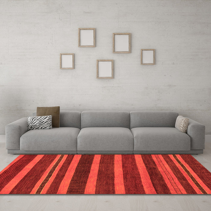 Machine Washable Abstract Orange Modern Area Rugs in a Living Room, wshabs220org
