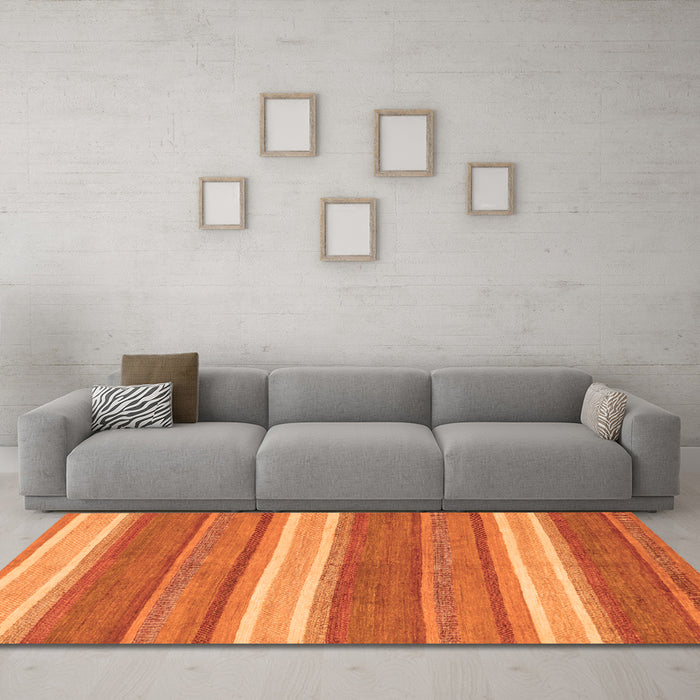 Machine Washable Abstract Orange Modern Area Rugs in a Living Room, wshabs221org