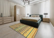 Abstract Golden Brown Yellow Oriental Rug in a Bedroom, abs2250