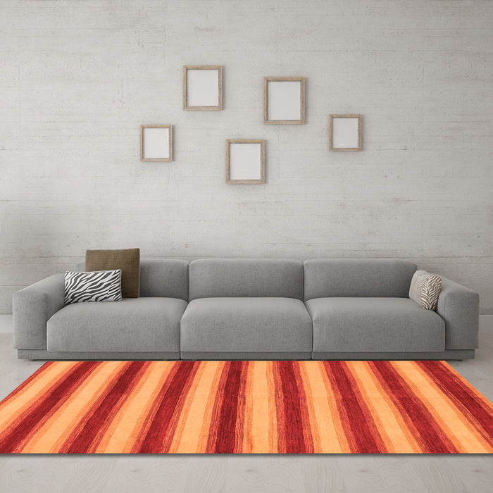 Machine Washable Abstract Orange Modern Area Rugs in a Living Room, wshabs226org