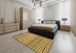 Abstract Golden Brown Yellow Oriental Rug in a Bedroom, abs2314