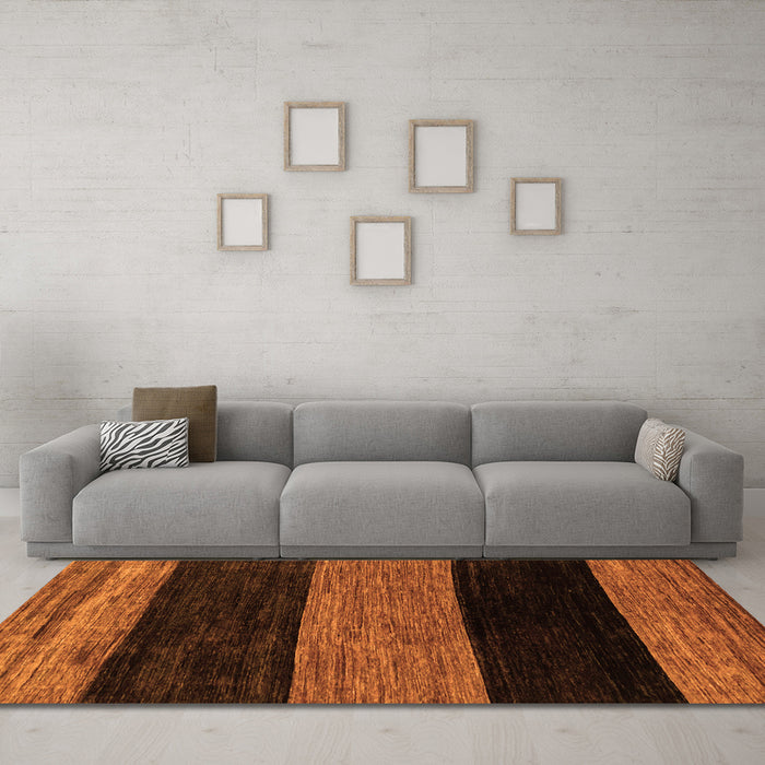 Machine Washable Abstract Orange Modern Area Rugs in a Living Room, wshabs2328org