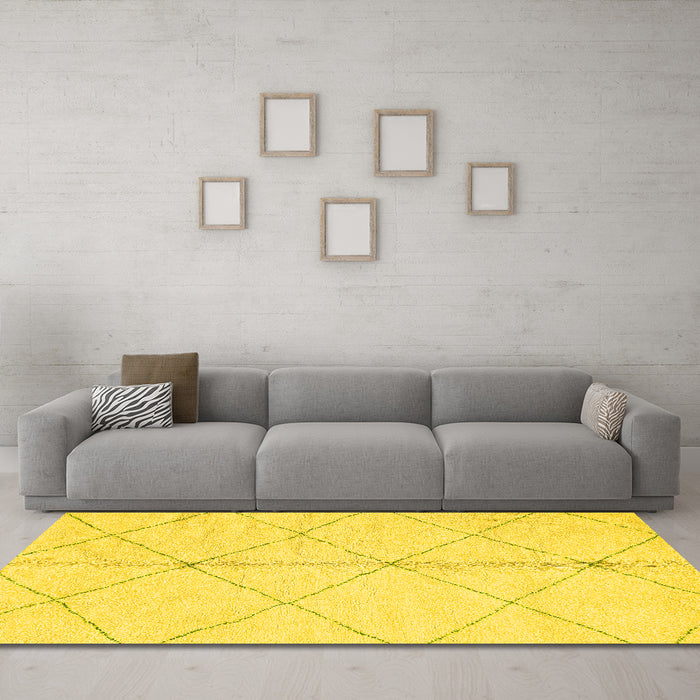 Machine Washable Solid Yellow Modern Rug in a Living Room, wshabs2333yw