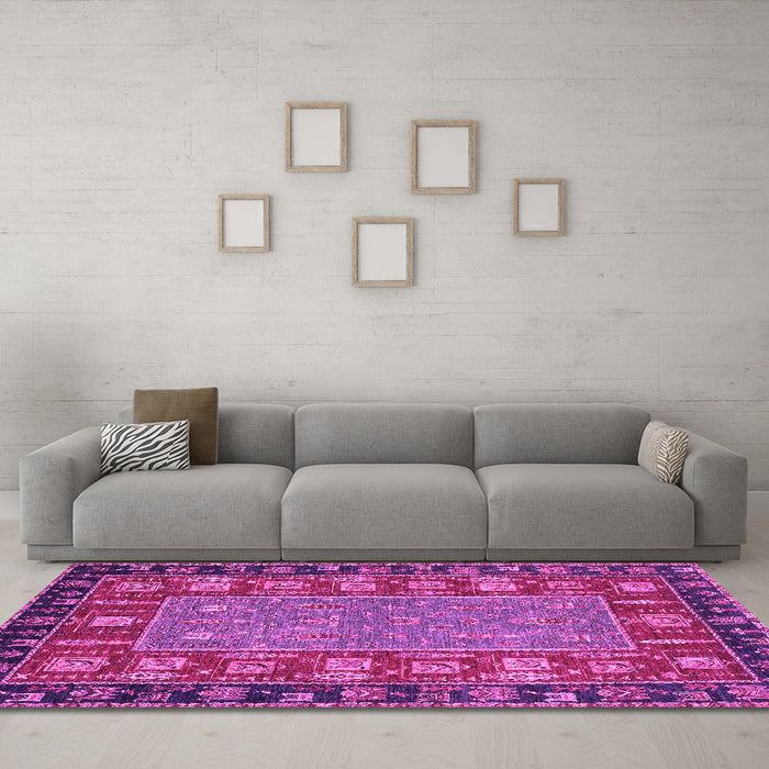 Machine Washable Animal Pink Traditional Rug in a Living Room, wshabs2376pnk