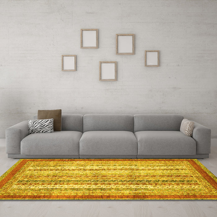 Machine Washable Abstract Yellow Modern Rug in a Living Room, wshabs2379yw