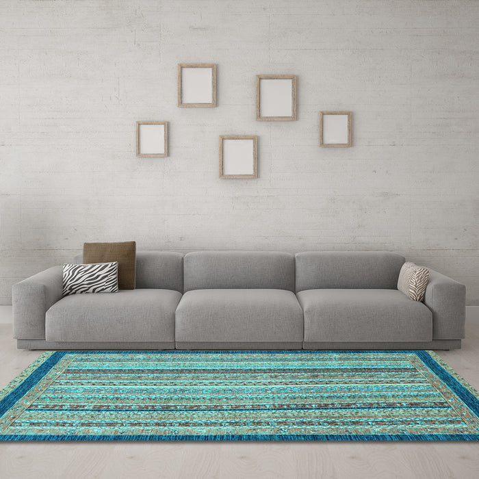 Machine Washable Oriental Light Blue Modern Rug in a Living Room, wshabs2402lblu