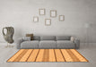 Machine Washable Solid Orange Modern Area Rugs in a Living Room, wshabs240org