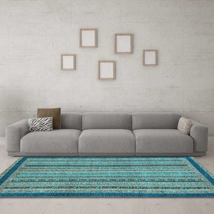 Machine Washable Oriental Light Blue Modern Rug in a Living Room, wshabs2410lblu
