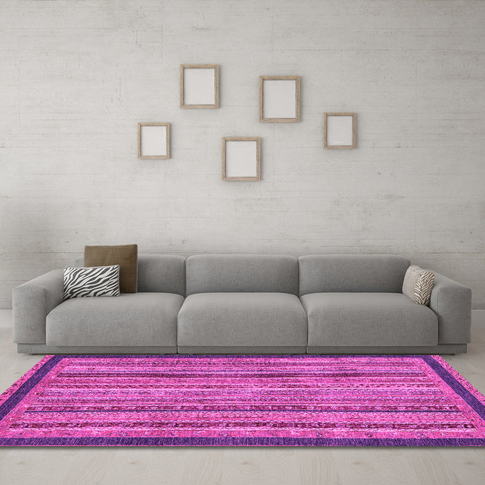 Machine Washable Oriental Pink Modern Rug in a Living Room, wshabs2410pnk
