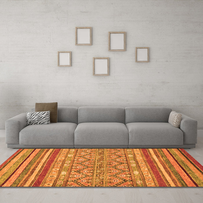 Machine Washable Abstract Orange Modern Area Rugs in a Living Room, wshabs2418org