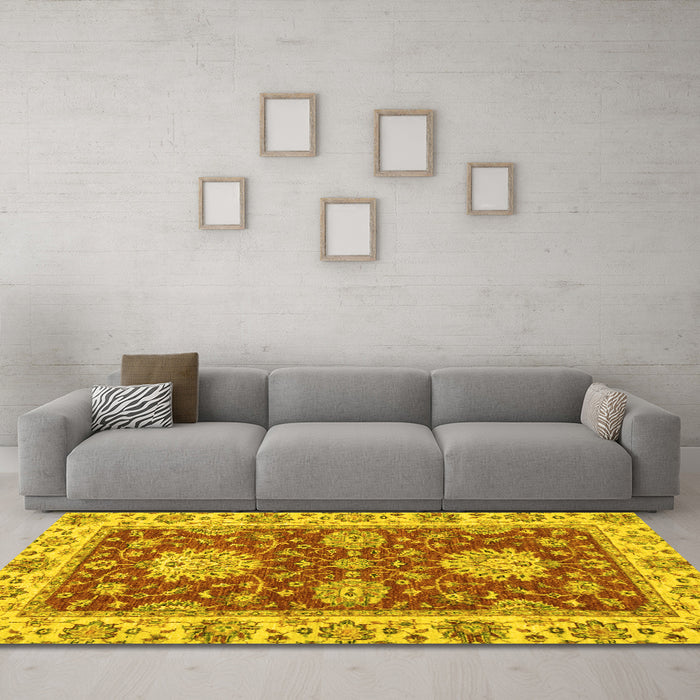 Machine Washable Oriental Yellow Traditional Rug in a Living Room, wshabs2435yw
