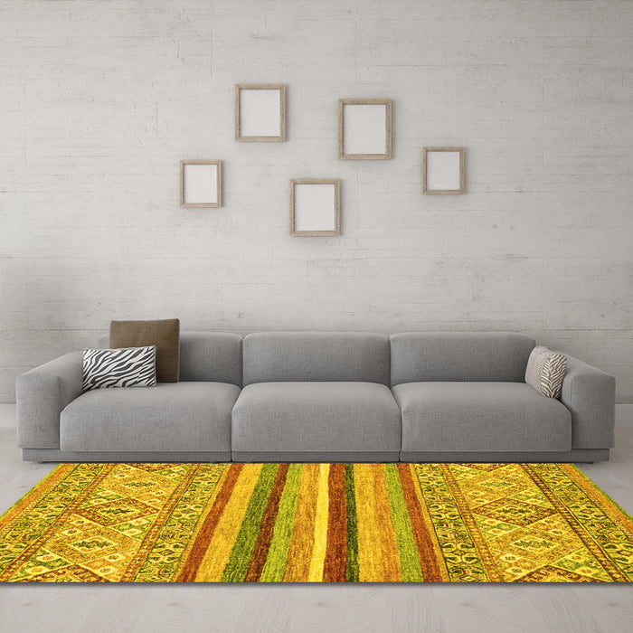 Machine Washable Abstract Yellow Modern Rug in a Living Room, wshabs2438yw