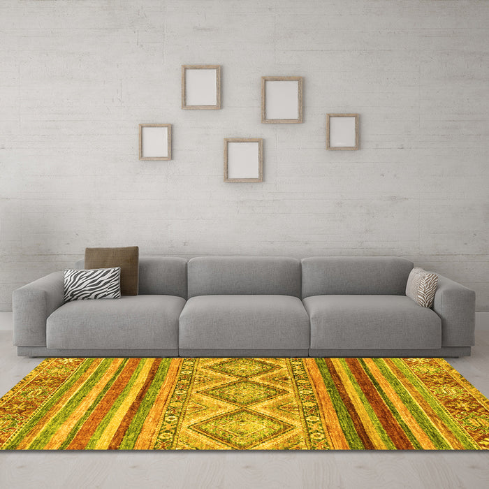 Machine Washable Southwestern Yellow Country Rug in a Living Room, wshabs2439yw