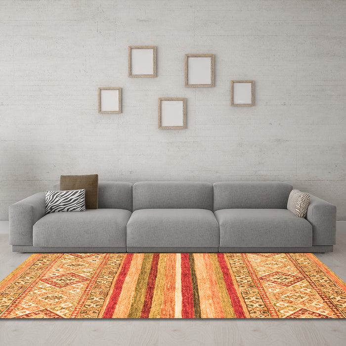 Machine Washable Abstract Orange Modern Area Rugs in a Living Room, wshabs2440org