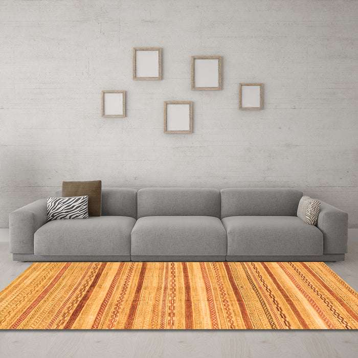 Machine Washable Abstract Orange Modern Area Rugs in a Living Room, wshabs2451org