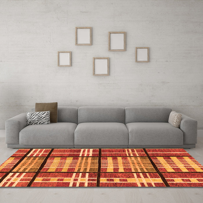 Machine Washable Abstract Orange Modern Area Rugs in a Living Room, wshabs247org