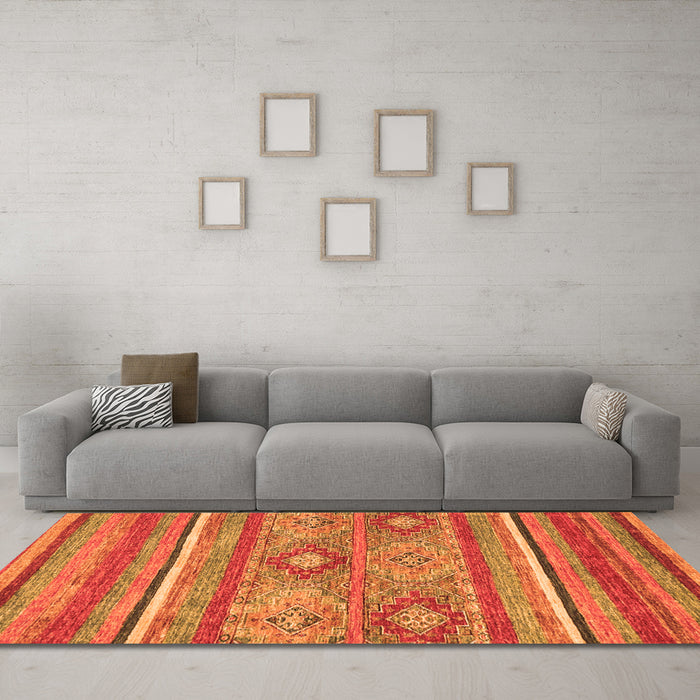 Machine Washable Abstract Orange Modern Area Rugs in a Living Room, wshabs2481org