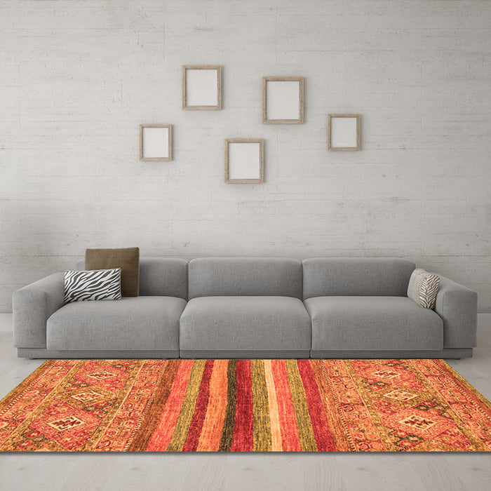Machine Washable Abstract Orange Modern Area Rugs in a Living Room, wshabs2482org