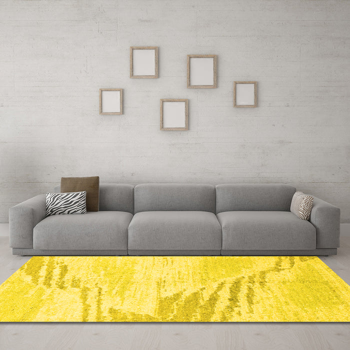 Machine Washable Solid Yellow Modern Rug in a Living Room, wshabs2537yw