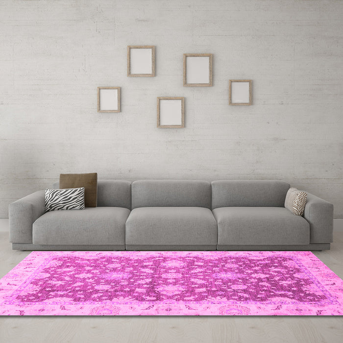 Machine Washable Oriental Pink Traditional Rug in a Living Room, wshabs2577pnk