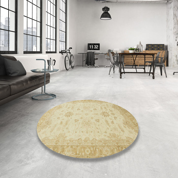 Round Abstract Brown Gold Oriental Rug in a Office, abs2578
