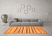 Machine Washable Solid Orange Modern Area Rugs in a Living Room, wshabs257org