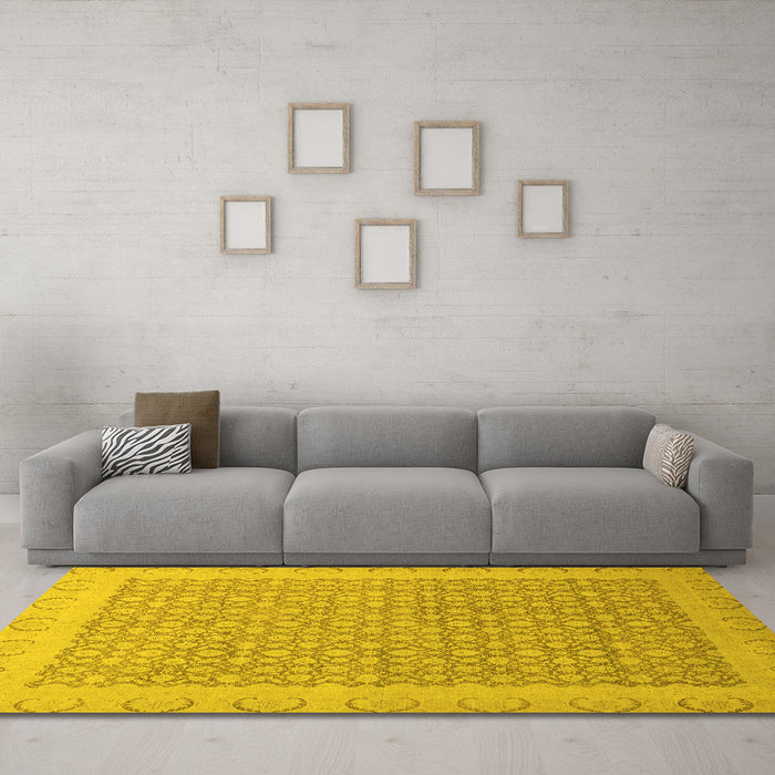 Machine Washable Oriental Yellow Traditional Rug in a Living Room, wshabs2580yw
