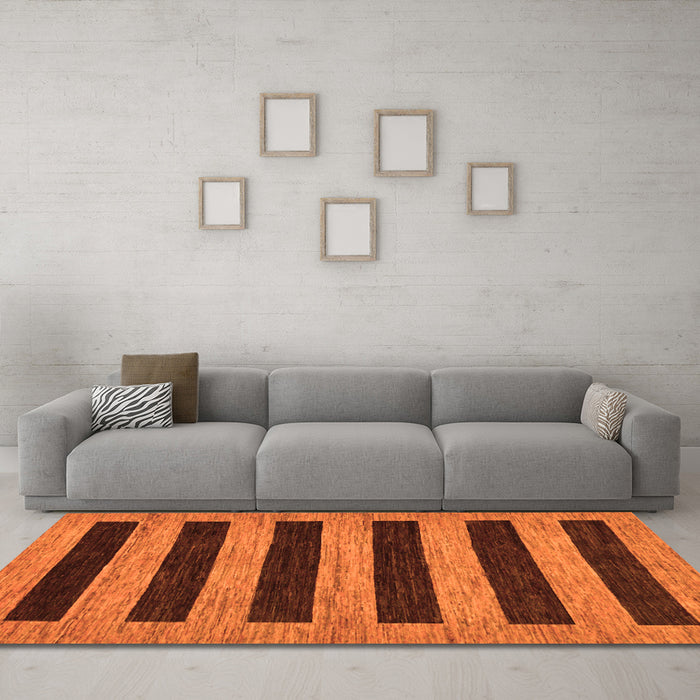 Machine Washable Abstract Orange Modern Area Rugs in a Living Room, wshabs260org