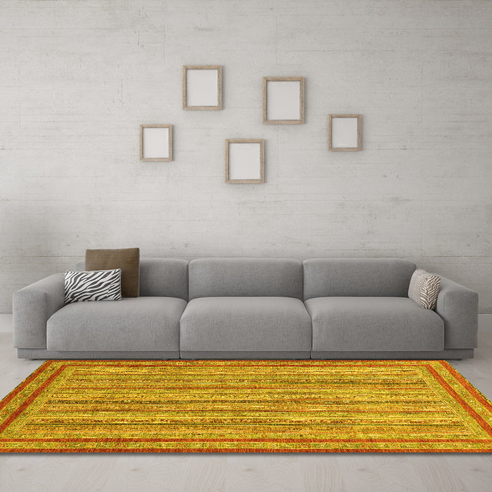 Machine Washable Abstract Yellow Modern Rug in a Living Room, wshabs2610yw