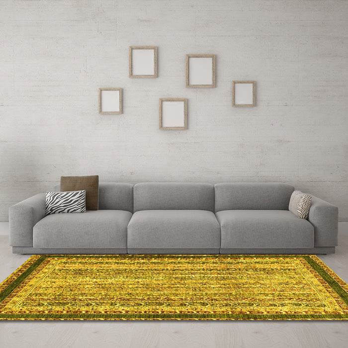 Machine Washable Oriental Yellow Modern Rug in a Living Room, wshabs2637yw