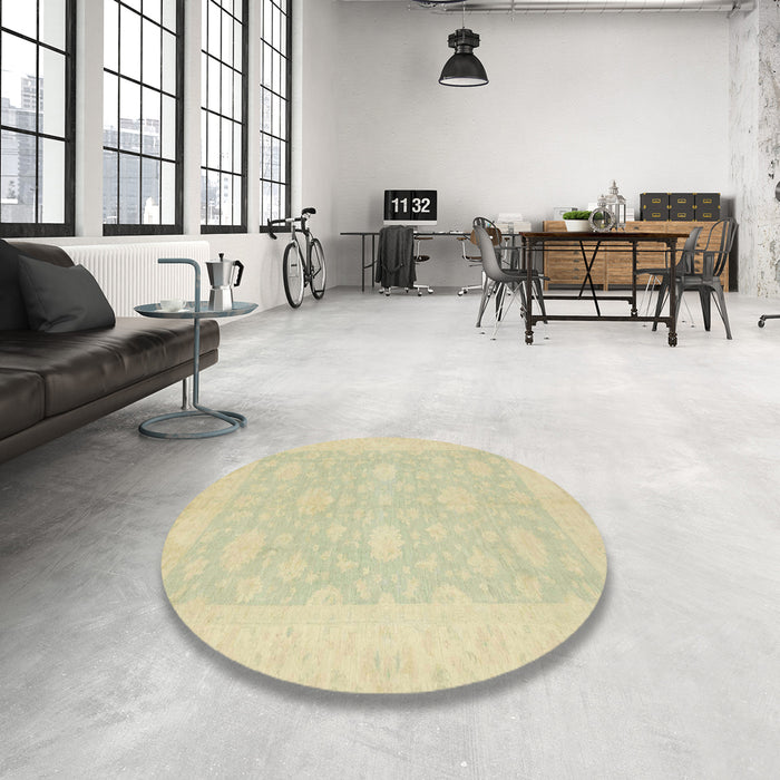 Round Abstract Brown Gold Oriental Rug in a Office, abs2650