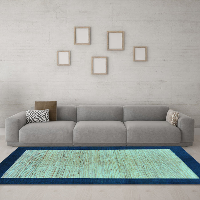 Machine Washable Oriental Light Blue Modern Rug in a Living Room, wshabs272lblu