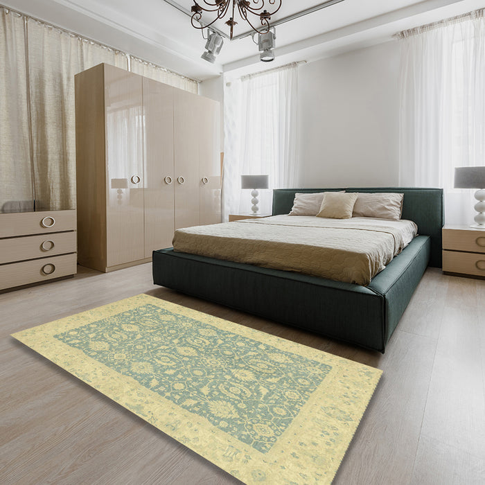 Abstract Brown Gold Oriental Rug in a Bedroom, abs2780