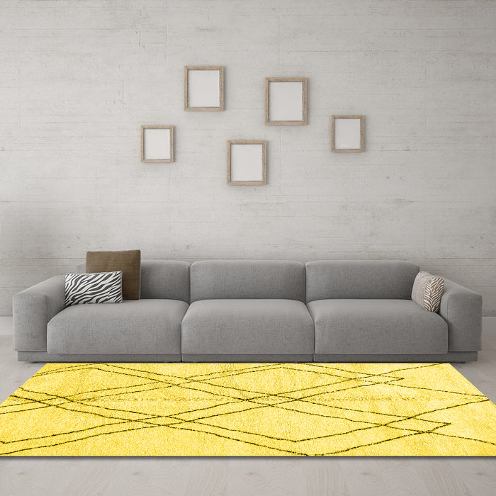 Machine Washable Solid Yellow Modern Rug in a Living Room, wshabs2898yw