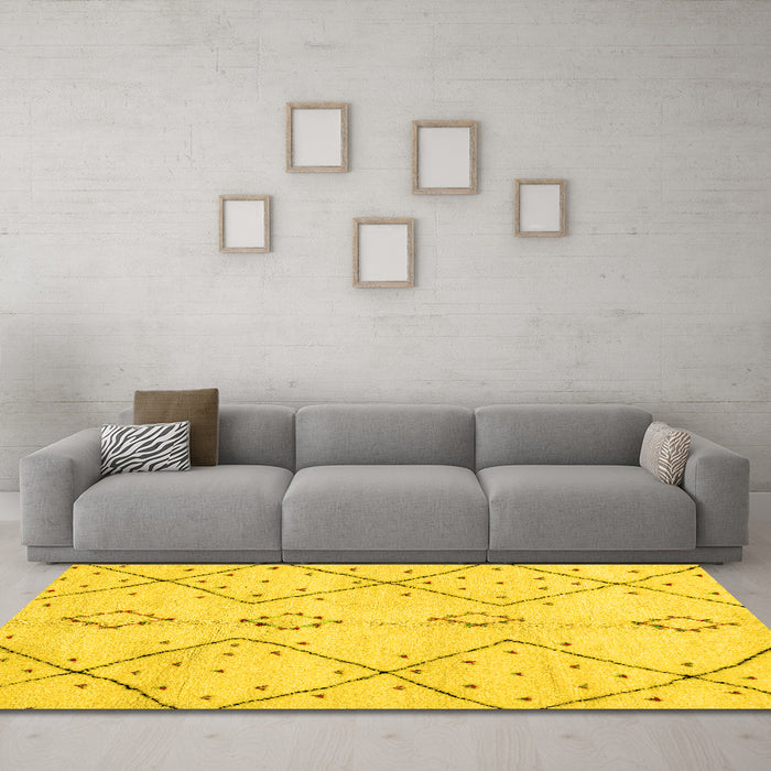 Machine Washable Solid Yellow Modern Rug in a Living Room, wshabs2899yw