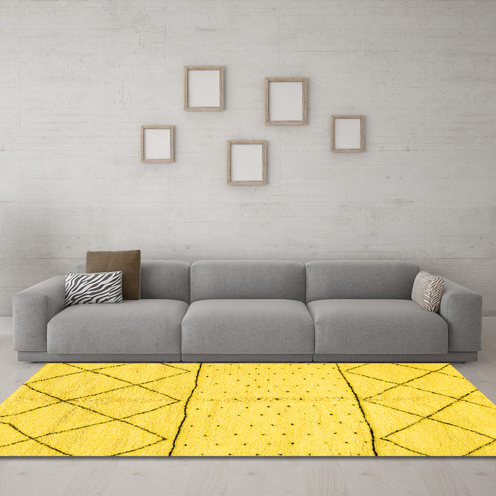 Machine Washable Solid Yellow Modern Rug in a Living Room, wshabs2903yw