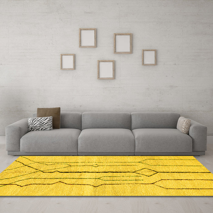 Machine Washable Solid Yellow Modern Rug in a Living Room, wshabs2905yw