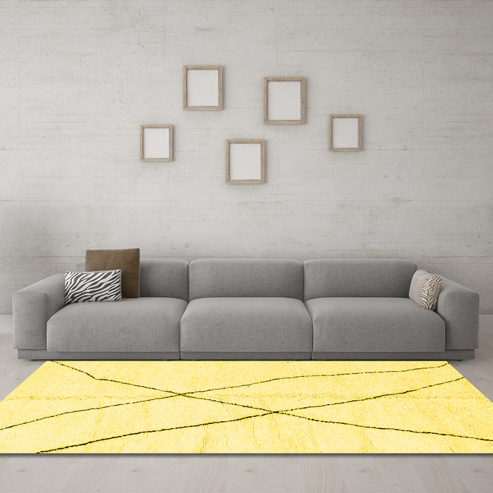 Machine Washable Solid Yellow Modern Rug in a Living Room, wshabs2908yw