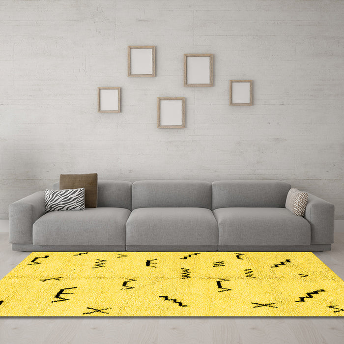 Machine Washable Solid Yellow Modern Rug in a Living Room, wshabs2909yw