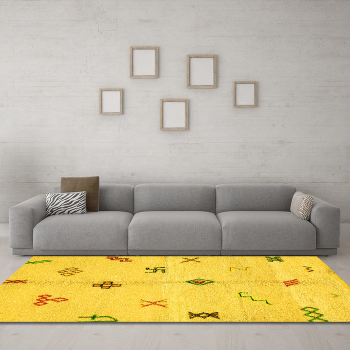Machine Washable Solid Yellow Modern Rug in a Living Room, wshabs2911yw