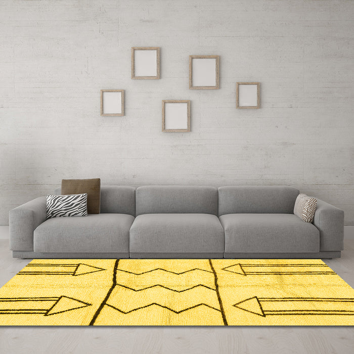 Machine Washable Solid Yellow Modern Rug in a Living Room, wshabs2912yw
