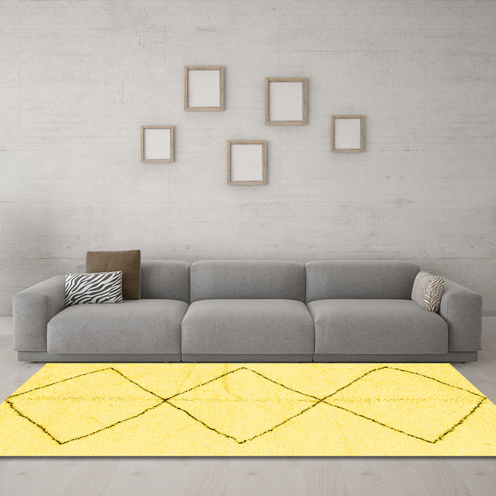 Machine Washable Solid Yellow Modern Rug in a Living Room, wshabs2915yw